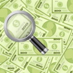 Magnifying glass money